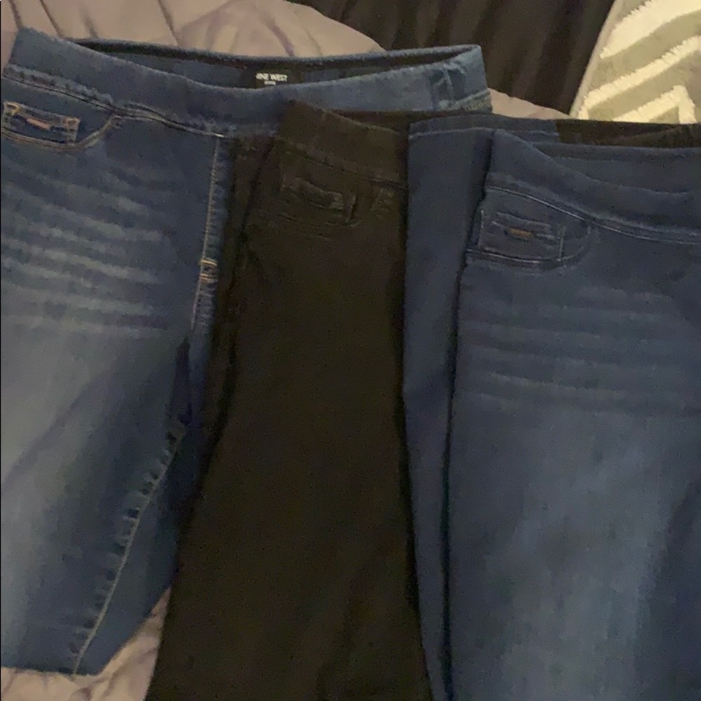 Dark blue, black, light blue jeggings. Nine West
